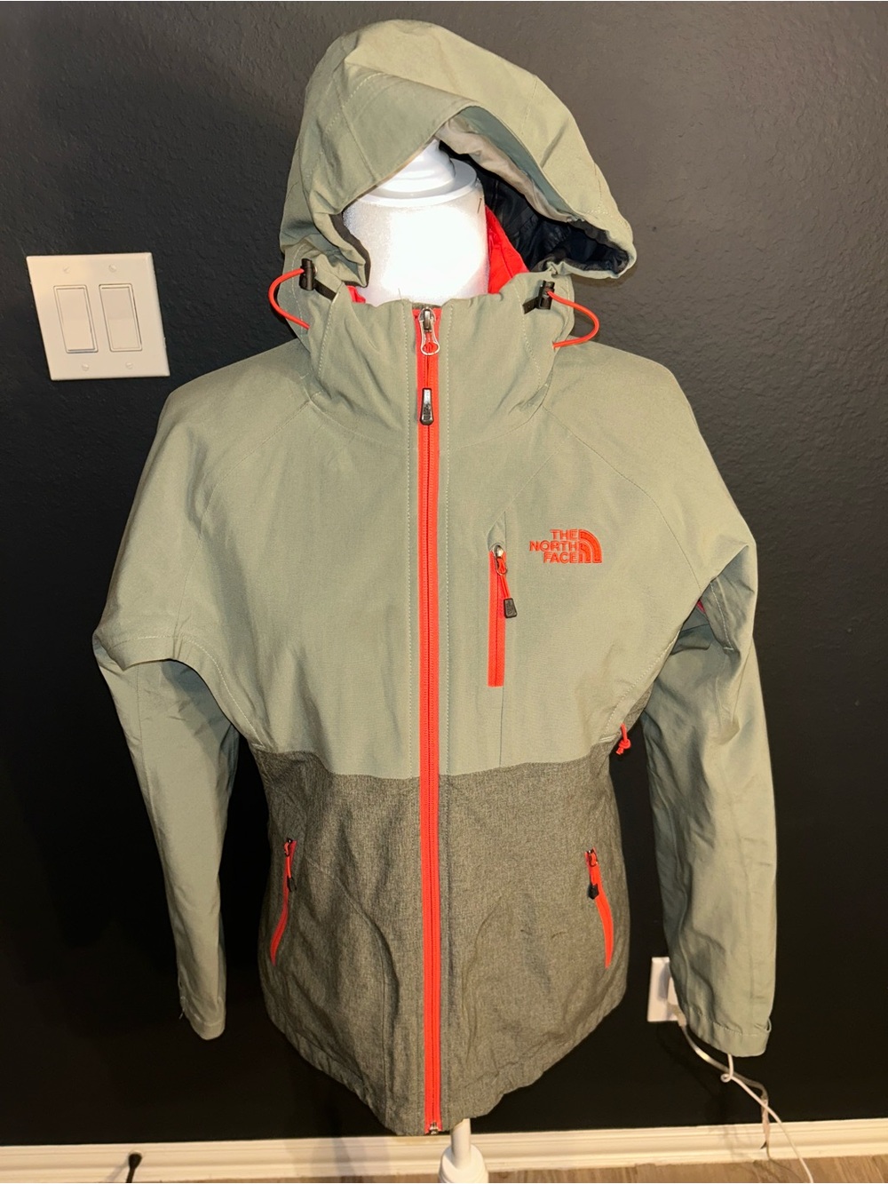 The North Face Sage Green Hooded Raincoat with Pink Accents